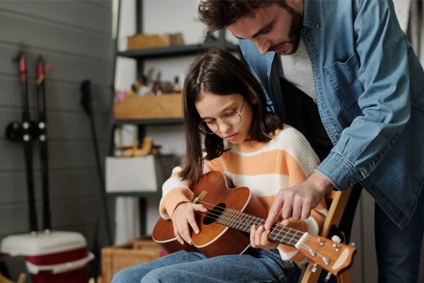 little-girl-in-eyeglasses-learning-to-play-guitar-2022-04-29-00-27-38-utc.jpg little-girl-in-eyeglasses-learning-to-play-guitar-2022-04-29-00-27-38-utc.jpg